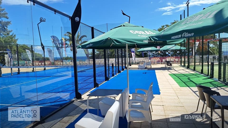 Blue padel courts at Panoramico with ocean views